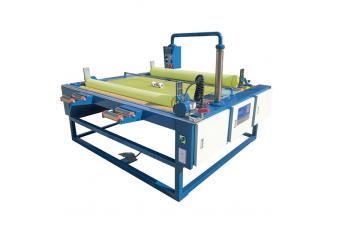 CLOTH ROLLING MACHINE
