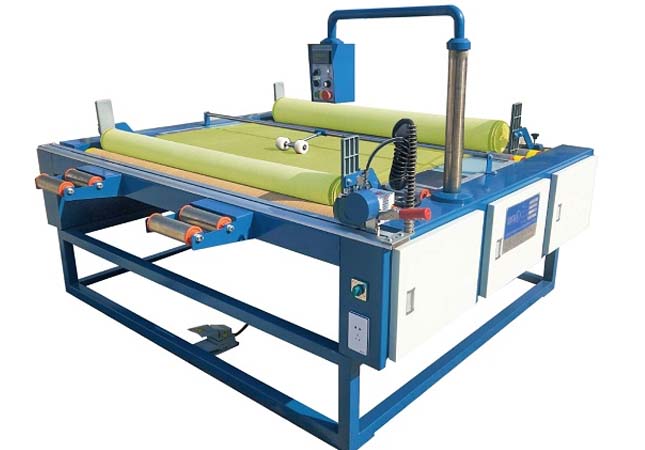 fabric measuring and cutting machine